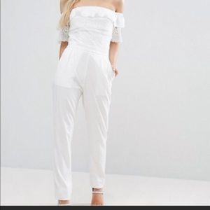 Boohoo Petite white off the shoulder jumpsuit with floral pattern. US 6